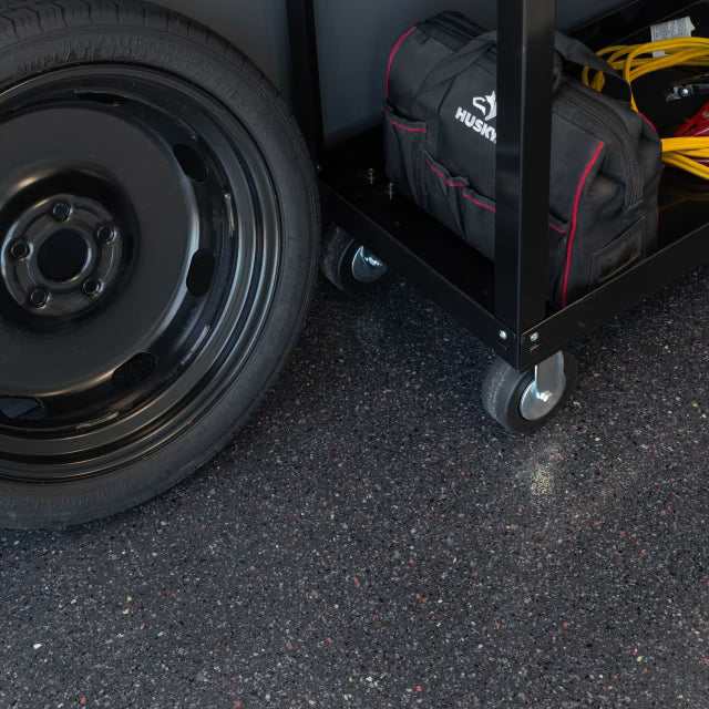 Installed Blacktop flake epoxy floor with industrial texture and multi-color contrast