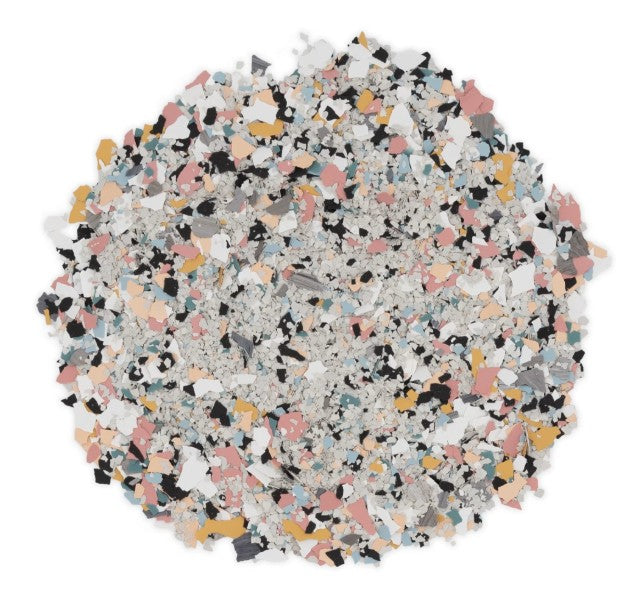 Sample pile of Gumball epoxy flake showing vibrant colors like blue, yellow, green, pink, and orange.