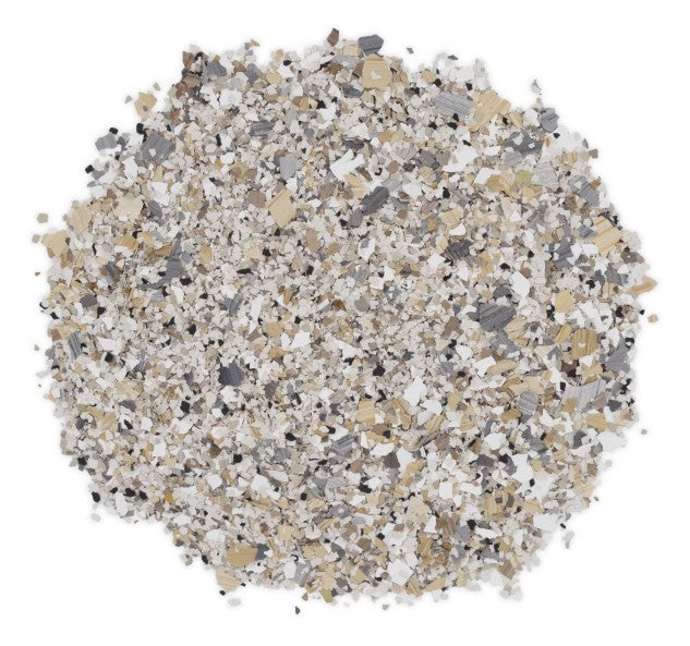 Quartzite hybrid epoxy flake – top-down view of tan, white, black, gray, and yellow chip blend.