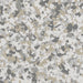 Top-down view of Antler epoxy flake – 1/4" light tan blend for decorative floors.